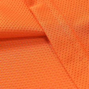 Maillot de football américain Y2K surdimensionné pour femme, orange, personnalisé, en maille, style streetwear, respirant, pour le jour du match, par le fabricant de t-shirts de sport - Product Image 5