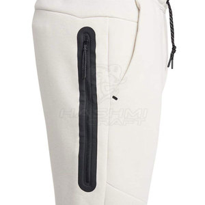 Jogging slim fit en molleton technique pour homme, style décontracté avec poches latérales, léger et facile à porter toute la journée, intérieur ou extérieur. - Product Image 5