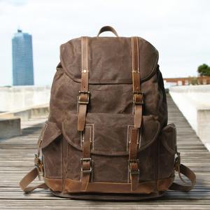 Sac à dos en cuir et toile, cuir véritable, résistant à l'eau, style moderne, pour ordinateur portable, haute qualité, vente en gros, fabricant OEM - Product Image 1