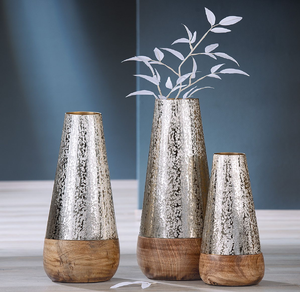 Chic speckled silver cone vases resting on natural rustic wooden bases, available at wholesale prices. - Product Image 1