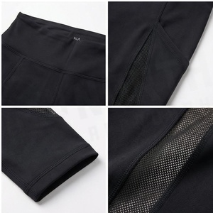 Leggings de yoga taille haute pleine longueur avec découpes en maille, extensibles dans quatre directions, sans coutures, couleur noire unie, vêtements de sport pour femmes - Product Image 4