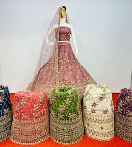 Dernier ensemble de mariée Lehenga Choli avec chemisier lourd, Dupatta et Allover Jarkan Stone Work | Tendance 10 Designs in Net - Product Image 1