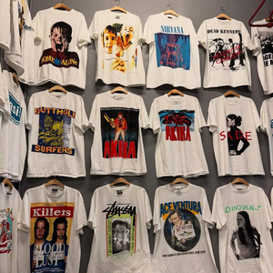 Camisetas vintage de los años 90 con estampados de bandas pop, ideales para revender, producto de gran venta en todas las plataformas en línea - Product Image 1