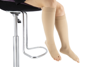 Vente en gros Bas de compression unisexe de haute qualité pour les genoux Chaussettes de compression pour infirmière avec logo personnalisé Chaussettes d'automne en nylon noir pour hommes