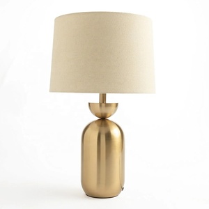 Lampe de table en métal Auric Capsule avec abat-jour en lin naturel, finition laiton brossé, lumière ambiante douce pour les espaces élégants - Product Image 4