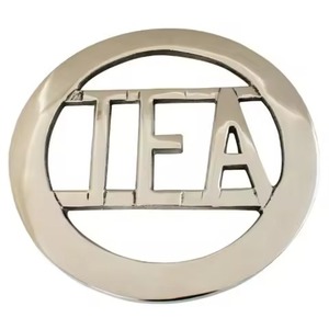 Sous-plat rond en métal doré orné de fleurs de lys, résistant à la chaleur, support pour casseroles et poêles, dessous de plat traditionnel, utilisation classique en cuisine - Product Image 3