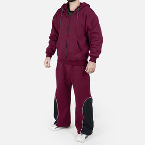 Ensemble de survêtement pour homme, coupe oversize et ample, en molleton technique, avec sweat à capuche à empiècements color block et pantalon jogger à jambe large, style streetwear et sport. - Product Image 1