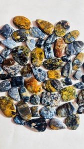 พลอยบลูพีเตอร์ไซต์เกรดท็อป รูปทรงคาโบชอง ลายธรรมชาติ พร้อมเอฟเฟกต์ไฟ  ขายส่งจำนวนมาก พลอยพีเตอร์ไซต์หลายสี - Product Image 5