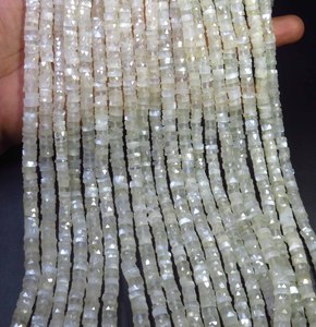 Cuentas de piedra lunar blanca Heishi facetadas de 5.5 mm con forma de rueda y perforación central, tira de 16 pulgadas, cuentas espaciadoras de piedra lunar natural con forma de neumático - Product Image 1