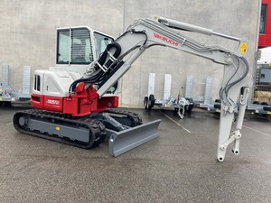 Mini-excavatrice Takeuchi TB257FR haut de gamme, design compact, performances hydrauliques puissantes pour les travaux de construction, de terrassement et de chantier. - Product Image 4