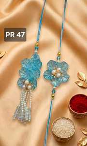 Flower Shape Plastic Rakhi <b>Set</b> with Pearl Tassels Handmade for Wedding Occasion - Product Image 2