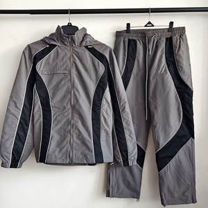 Conjunto Deportivo de Nylon Transpirable de Alta Calidad, Chaqueta con Capucha y Pantalones Deportivos con Cierre, Cortavientos, Nueva Colección de Invierno - Product Image 1