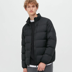 Chaqueta Acolchada Negra para Hombre con Cuello Alto, Cierre de Cremallera, Relleno de Poliéster, Resistente al Viento, para Uso Casual de Invierno - Product Image 1