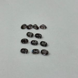 สปิเนลสีเทาธรรมชาติรุ่นลิมิเต็ดอิดิชั่น รูปทรงวงรี ขนาด 6x4 มม. ปรับขนาดแล้ว ไม่ผ่านการบำบัด จากแทนซาเนีย ขายส่ง คุณภาพดี - Product Image 5