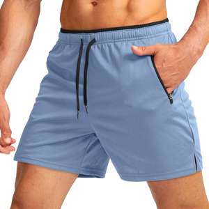Shorts de sport bleus pour hommes à séchage rapide avec poches zippées, taille à cordon de serrage, longueur mi-cuisse, couleur unie, tissu tricoté - Product Image 3