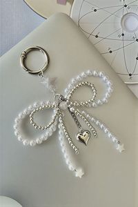 Porte-clés brodés faits main en gros avec des motifs de perles complexes pour accessoires promotionnels et cadeaux - Product Image 5