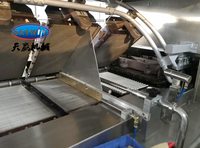 Ligne industrielle automatique de fabrication de gaufrettes avec cuisson en feuille, superposition et découpe de précision