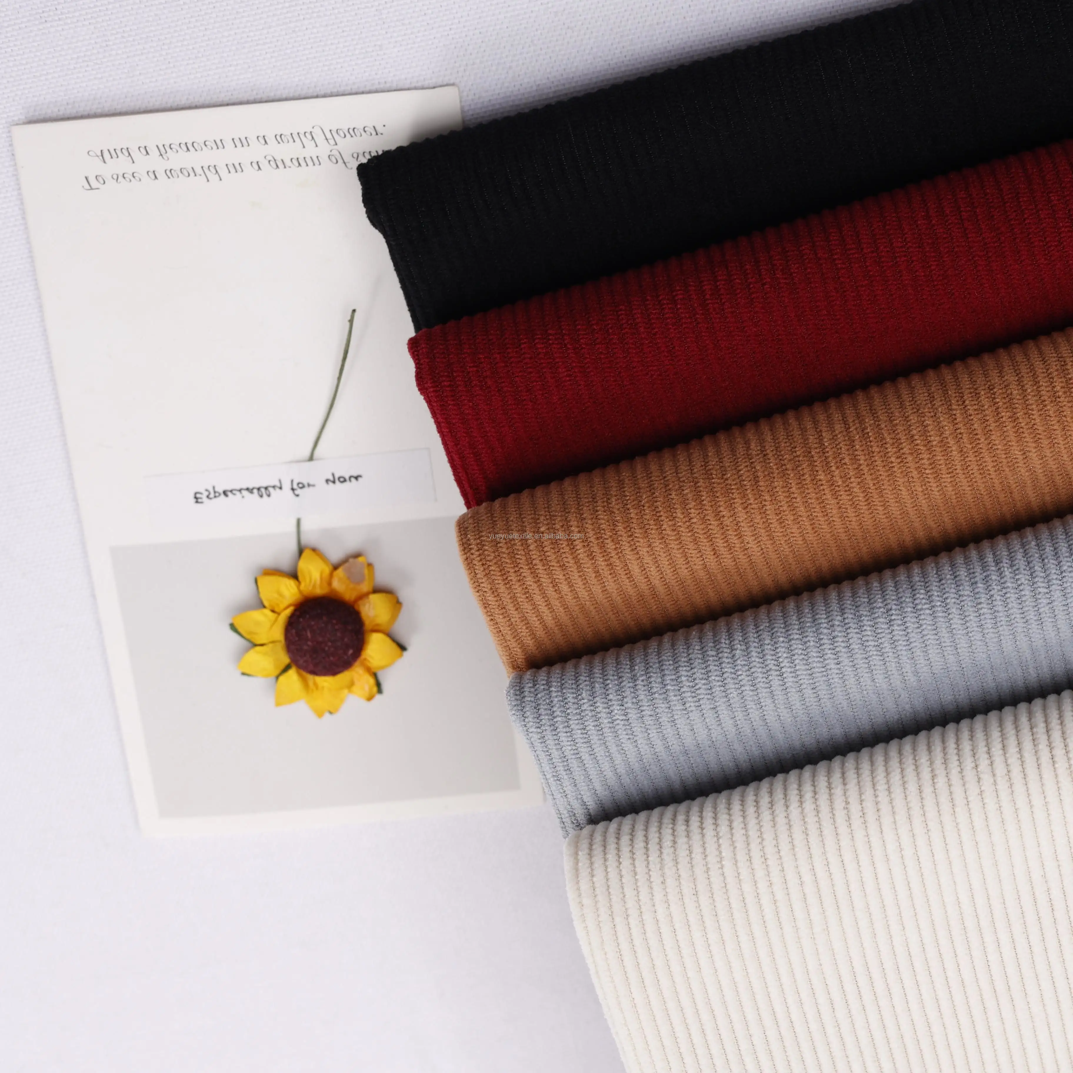 Fábrica personalizada de alta calidad suave 8W de ancho Wale 100% pantalones de tela de pana algodón Spandex tela de pana elástica para abrigos