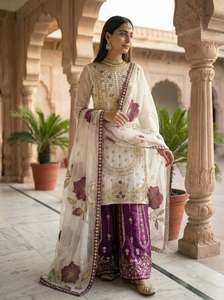 Ensemble prêt-à-porter entièrement cousu en soie Jimmy avec broderie de créateur, pantalon Plazzo et dupatta en organza Tabby, idéal pour les soirées. - Product Image 1