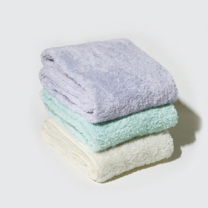 Serviettes de bain et de visage rectangulaires absorbantes en coton compressé de couleur unie Carari - Teintes unies - Product Image 1
