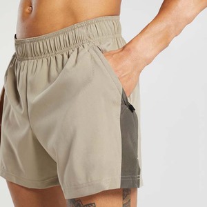 กางเกงขาสั้นลำลองสำหรับผู้ชาย - ผ้าเนื้อบางเบาและระบายอากาศได้ดี พร้อมเทคโนโลยีแห้งเร็วที่เป็นมิตรต่อสิ่งแวดล้อม สำหรับการวิ่งและการออกกำลังกายในยิม - Product Image 4