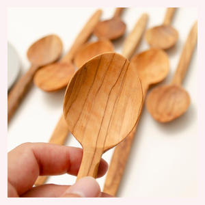 High Quality Olive Wood Kitchen Spoon with Classic Design and Smooth Grip for Comfortable Cooking Experience - Product Image 1