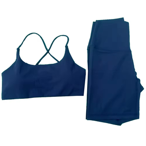 Women's Solid Navy <b>Blue</b> 2-Piece Yoga Set Criss-Cross Sports <b>Bra</b> Pocket Leggings Breathable Knitted Polyester Knee-Length All - Product Image 1