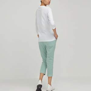 Proveedor mayorista de camisetas deportivas personalizadas para mujer, de alta calidad, ecológicas, transpirables, de secado rápido, manga larga y corte ajustado. - Product Image 6