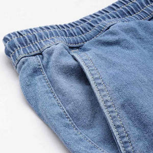 กางเกงยีนส์ขาสั้นผู้ชายสไตล์วัยรุ่นสุดเทรนด์ ดีไซน์ดิสเทรส ผ้าฝ้ายผสมระบายอากาศได้ดี เหมาะสำหรับฤดูหนาว - Product Image 6