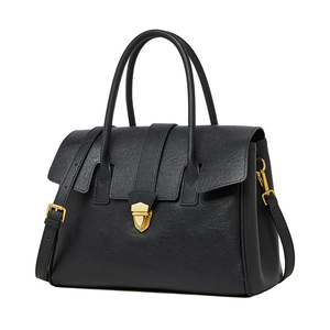 Elegante Bolso Tote de Cuero Genuino Negro con Cierre de Broches Dorados para Uso Diario - Product Image 1