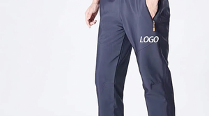 Pantalon de jogging décontracté pour homme en polyester bleu foncé à taille élastique, séchage rapide, avec poches et logo sur la jambe droite, idéal pour l'automne - Product Image 6
