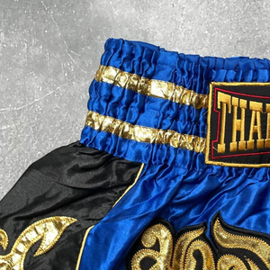 กางเกงมวยไทย MMA ราคาโรงงาน สั่งทำได้ โลโก้แบบเรียบ 100% โพลีเอสเตอร์ แห้งเร็ว ระบายอากาศ ป้องกันรังสียูวี เป็นมิตรกับสิ่งแวดล้อม สำหรับทุกเพศ - Product Image 6