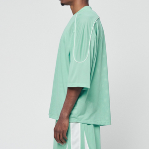 ชุดเสื้อฟุตบอลอเมริกันสีเขียวมิ้นท์พรีเมียม ผ้าตาข่าย แต่งขอบตัดสี ทรงโอเวอร์ไซส์ ไหล่ตก ผลิตตามสั่งแบบ B2B - Product Image 3