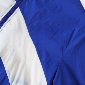 เสื้อแจ็คเก็ตบอมเบอร์แบบมีซิปเต็มตัว สีฟ้ารอยัลบลู ลายพิมพ์สีขาว คอตั้ง น้ำหนักเบา กันลม มีกระเป๋าหน้า ไซส์พลัส - Product Image 6