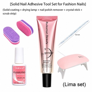 Kit d'adhésif solide pour ongles avec colle à appliquer au pinceau et bandes exfoliantes pour le soin des ongles - Product Image 5