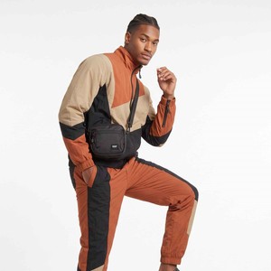 Conjunto de 2 piezas de pantalones deportivos softshell con cremallera personalizados para hombre, con ribetes y puños elásticos, chándal unisex de nailon con bloques de color y cortavientos. - Product Image 2