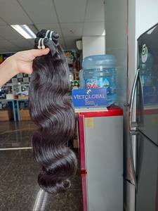 Vente en gros Extensions de cheveux en trame naturelle du Vietnam Paquets de cheveux Super Body Wave bruts Cheveux humains vietnamiens - Product Image 6