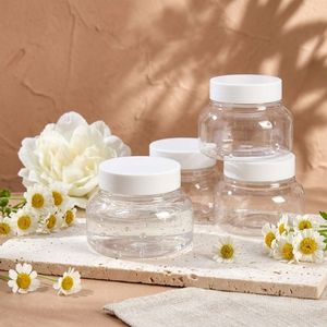 ขวด PET ทรงกลมสำหรับเครื่องสำอาง ขนาด 100 มล. ภาชนะพลาสติกใสพร้อมฝาเกลียวสีขาว สำหรับครีมทาตัว ผลิตโดยโรงงาน OEM ในเวียดนาม - Product Image 3