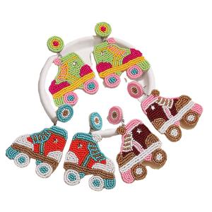 Boucles d'oreilles perlées bohèmes faites à la main, style rétro, patins à roulettes, perles de riz, par MD HANDICRAFTS - Product Image 1