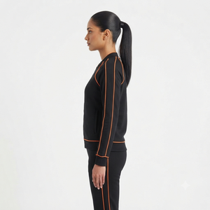 Survêtement sportif noir pour femme avec passepoil orange, manches longues, col rond, séchage rapide, coupe classique, idéal pour l'automne - Product Image 4