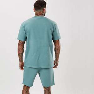 Conjunto de verano para hombre de dos piezas con camisa y pantalones cortos diseñado para clima cálido, viajes a la playa, uso diario informal y para el hogar, en oferta. - Product Image 4