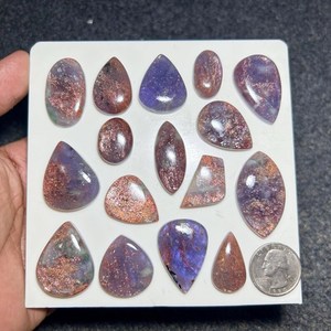พลอยไอโอไลต์ซันสโตนทรงคาโบชองธรรมชาติ |   พลอยสีน้ำเงินส้มประกายระยิบระยับ |   อัญมณีสำหรับทำเครื่องประดับแบบแยกชิ้น |   ของขวัญคริสตัลดีไซน์เนอร์ |   อามาน - Product Image 6
