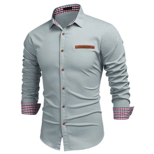 เสื้อเชิ้ตทรงคลาสสิกแบบติดกระดุม แขนยาว สำหรับผู้ชาย เหมาะสำหรับธุรกิจและการสวมใส่ในโอกาสที่เป็นทางการ - Product Image 1