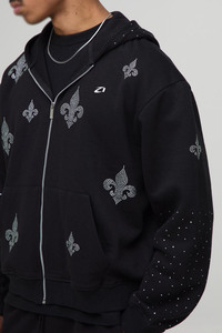 Sudadera con capucha negra para hombre, con detalle de flor de diamantes de imitación en la manga, de algodón grueso y forro polar, estilo oversize, fabricación de ropa urbana. - Product Image 6