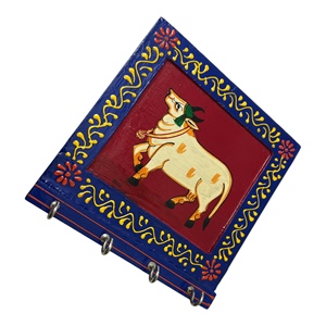 Colgador de Llaves de Madera Pintado a Mano con Diseño de Toro, Marco Azul, Fondo Rojo y Borde Floral Amarillo - Product Image 1