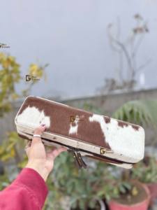 กระเป๋าหนังวัวแท้ ทนความร้อน สำหรับใส่เครื่องหนีบผมและเครื่องม้วนผม คุณภาพสูง จัดระเบียบอุปกรณ์ทำผมได้อย่างสมบูรณ์แบบ - Product Image 3