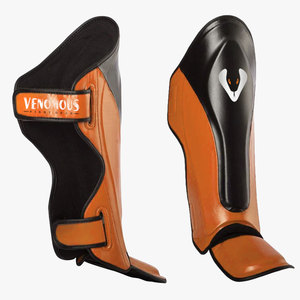 Espinilleras Venomous de cuero negro y naranja con cierre ajustable de velcro, protección profesional para adultos, para todas las estaciones - Product Image 1