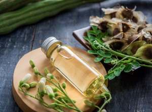 High Purity Moringa Oil Used for Skin and <b>Hair</b> Care <b>Treatment</b> Whole Sale Exporters and Suppliers From South India at Best Price - Product Image 2