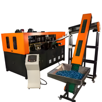 Machine de soufflage par injection semi-automatique à 4 cavités, moteur Mitsubishi PLC 50 kW pour bouteilles d'eau minérale en PET/PC/PP/SMC