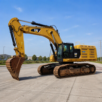 Pelle sur chenilles Caterpillar 374FL d'occasion, puissante pelle mécanique de 74 tonnes pour les projets de chantier